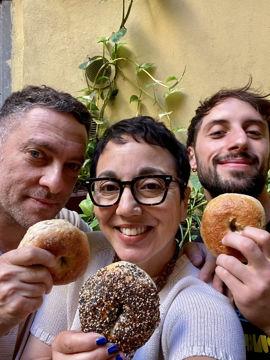 Steve, Linda and Emanuele holding bagels